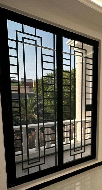 main door safety grill design Pakistan 2026